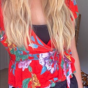 Red floral wrap top